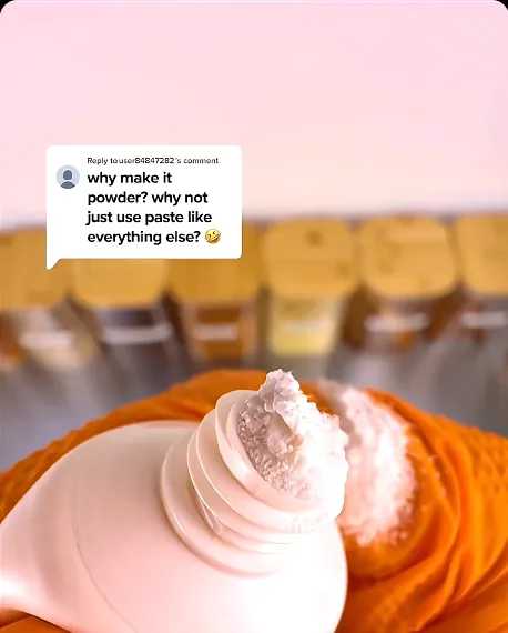 Pearl Powder coming out of the bottle in orange gloves