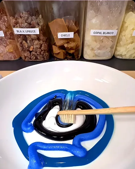 Regular toothpaste swirled on a white plate
