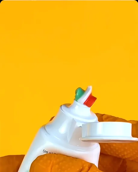 A popular toothpaste tube held up close